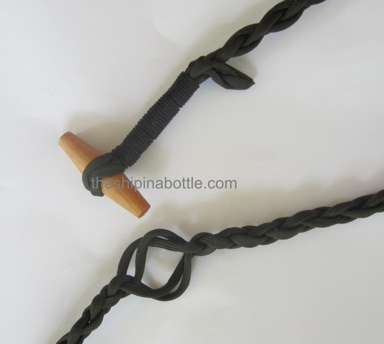 Securing the toggle in a point along the rope